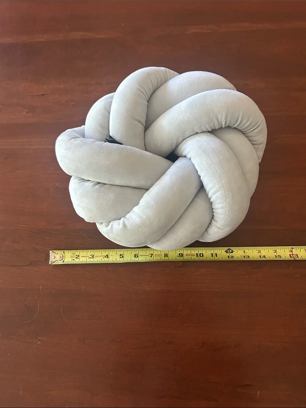 Cuddle Duds 14” Plush Knot Throw Pillow in Light Gray
